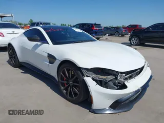 2019 Aston Martin Vantage z VIN SCFSMGAW4KGN01848, wystawiony jako IAAI lot #42032076 z przebiegiem 54 469 mil mil oraz . Historia ofert i sprzedaży dostępna na DreamBid. Obrazek 1.
