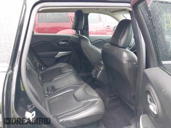 2018 Jeep Cherokee Latitude Plus with VIN 1C4PJLLX7JD504352, listed as a IAAI auction lot 42015977 with 85,157 mi miles and . Bid and sale history available at DreamBid. Image 8.