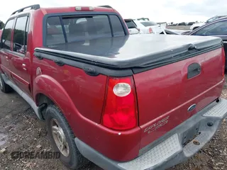 2004 Ford Explorer Sport Trac XLS z VIN 1FMZU77K84UB72038, wystawiony jako IAAI lot #42359818 z przebiegiem 146 619 mil mil oraz . Historia ofert i sprzedaży dostępna na DreamBid. Obrazek 3.