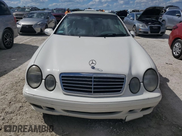 2003 Mercedes-Benz CLK-Class 3.2L with VIN WDBLK65G73T135929, listed as a Copart auction lot 76175704 with 114,677 mi miles and Salvage Title. Bid and sale history available at carsss.com. Image 5.