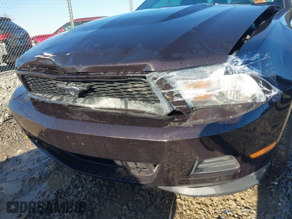 2012 Ford Mustang Premium with VIN 1ZVBP8AM4C5210870, listed as a IAAI auction lot 41521473 with 113,376 mi miles and . Bid and sale history available at DreamBid. Image 6.