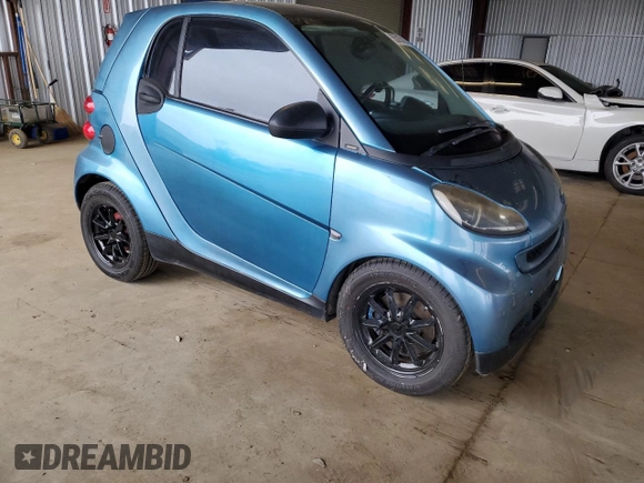 2009 Smart fortwo Pure with VIN WMEEJ31XX9K264071, listed as a Copart auction lot 55315705 with 117,006 mi miles and Salvage Title. Bid and sale history available at carsss.com. Image 4.