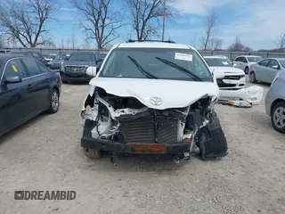 2013 Toyota Sienna LE AAS with VIN 5TDKK3DC4DS346029, listed as a IAAI auction lot 41860913 with 229,218 mi miles. Bid and sale history available at carsss.com. Image 12.