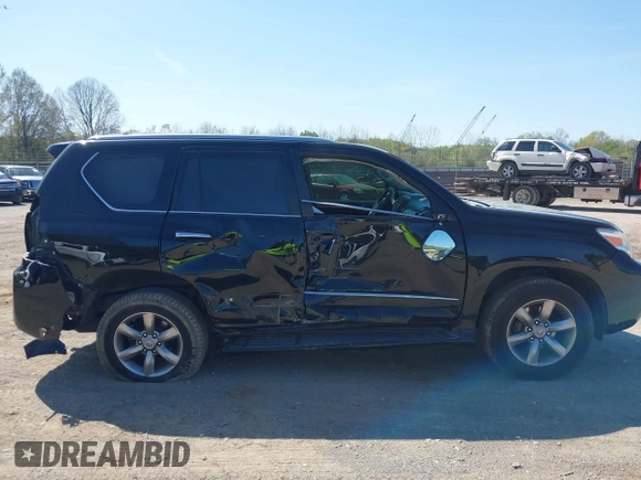 2013 Lexus GX 460 Premium z VIN JTJJM7FX8D5063276, wystawiony jako IAAI lot #41922536 z przebiegiem 162 110 mil mil oraz . Historia ofert i sprzedaży dostępna na DreamBid. Obrazek 13.