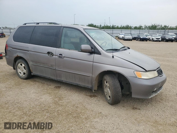 2000 Honda Odyssey EX z VIN 2HKRL186XYH010384, wystawiony jako Copart lot #60871845 z przebiegiem 423 167 mil mil oraz Czysty tytuł • Clean title. Historia ofert i sprzedaży dostępna na DreamBid. Obrazek 4.