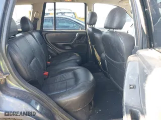 2002 Jeep Grand Cherokee Laredo with VIN 1J4GW48N72C261741, listed as a IAAI auction lot 40972222 with 174,516 mi miles. Bid and sale history available at carsss.com. Image 8.