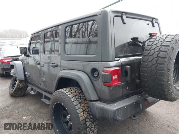 2020 Jeep Wrangler Unlimited Sport z VIN 1C4HJXDN3LW164701, wystawiony jako IAAI lot #41200437 z przebiegiem 102 272 mil mil oraz . Historia ofert i sprzedaży dostępna na DreamBid. Obrazek 3.