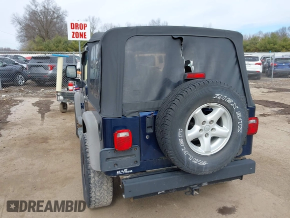 2005 Jeep Wrangler Sport with VIN 1J4FA49S05P384308, listed as a IAAI auction lot 41821354 with 106,394 mi miles. Bid and sale history available at carsss.com. Image 3.