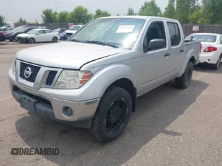 2011 Nissan Frontier Pro-4X with VIN 1N6AD0EV8BC434100, listed as a IAAI auction lot 42745419 with 264,222 mi miles and . Bid and sale history available at DreamBid. Image 17.