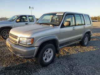 2002 Isuzu Trooper S with VIN JACDS58X627J11588, listed as a Copart auction lot 76932404 with Not Provided miles and Salvage Title. Bid and sale history available at DreamBid. Image 1.
