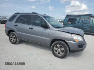 2009 Kia Sportage LX with VIN KNDJF724597601906, listed as a Copart auction lot 45317365 with 196,474 mi miles and Salvage Title. Bid and sale history available at carsss.com. Image 4.