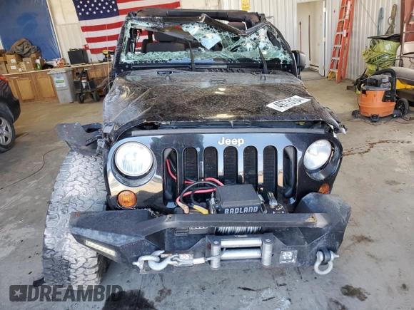 2011 Jeep Wrangler Unlimited Sport with VIN 1J4BA3H1XBL514681, listed as a Copart auction lot 49773154 with 0 mi miles and Salvage Title. Bid and sale history available at carsss.com. Image 5.