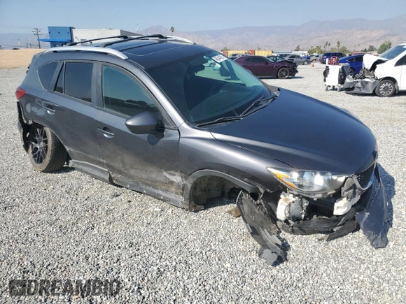 2014 Mazda CX-5 Touring with VIN JM3KE4CY6E0375084, listed as a Copart auction lot 46344065 with 143,828 mi miles and Salvage Title. Bid and sale history available at carsss.com. Image 4.