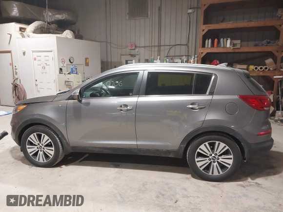 2016 Kia Sportage EX with VIN KNDPCCACXG7869254, listed as a IAAI auction lot 41830706 with 107,448 mi miles and . Bid and sale history available at carsss.com. Image 14.