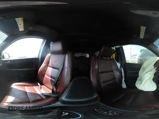 2023 Dodge Durango R/T Plus with VIN 1C4SDHCT7PC686970, listed as a IAAI auction lot 42156304 with 14,592 mi miles and . Bid and sale history available at DreamBid. Image 18.
