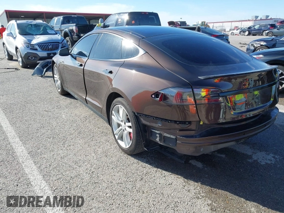 2014 Tesla Model S 60 with VIN 5YJSA1H17EFP33275, listed as a IAAI auction lot 41778167 with 202,749 mi miles and . Bid and sale history available at DreamBid. Image 3.