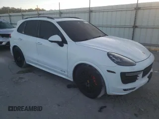 2017 Porsche Cayenne GTS with VIN WP1AD2A29HLA83277, listed as a Copart auction lot 76765974 with 47,838 mi miles and Salvage title. Bid and sale history available at DreamBid. Image 4.