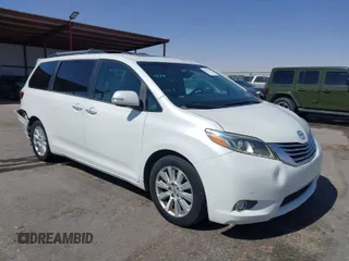 2015 Toyota Sienna XLE with VIN 5TDYK3DC8FS546599, listed as a IAAI auction lot 41647342 with 124,072 mi miles. Bid and sale history available at carsss.com. Image 1.