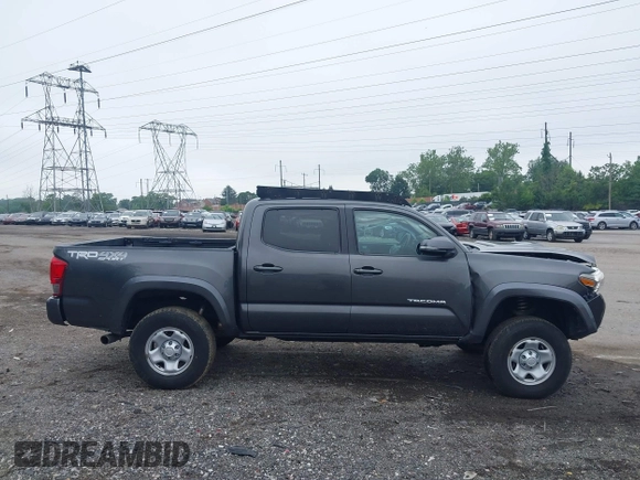 2017 Toyota Tacoma SR5 with VIN 3TMCZ5ANXHM089093, listed as a IAAI auction lot 42513711 with 86,022 mi miles and . Bid and sale history available at DreamBid. Image 13.