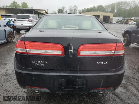 2012 Lincoln MKZ z VIN 3LNHL2GC3CR807053, wystawiony jako Copart lot #56425195 z przebiegiem 114 669 mil mil oraz Czysty tytuł • Clean title. Historia ofert i sprzedaży dostępna na DreamBid. Obrazek 6.