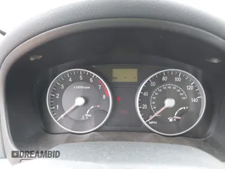 2006 Hyundai Accent GLS z VIN KMHCN46C76U038040, wystawiony jako IAAI lot #42220455 z przebiegiem 140 413 mil mil oraz . Historia ofert i sprzedaży dostępna na DreamBid. Obrazek 7.