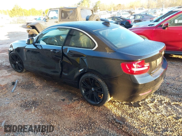 2015 BMW 2 Series 228i with VIN WBA1F5C55FV256604, listed as a IAAI auction lot 41841754 with 118,354 mi miles. Bid and sale history available at carsss.com. Image 3.