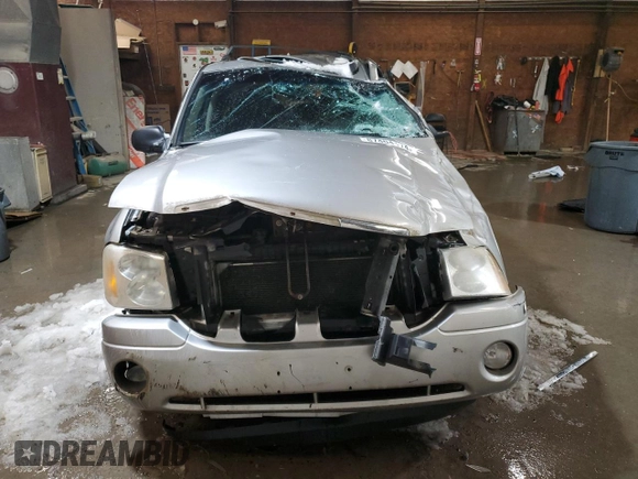 2007 GMC Envoy SLE with VIN 1GKDT13S572301992, listed as a Copart auction lot 87404174 with 131,741 mi miles and Salvage Title. Bid and sale history available at carsss.com. Image 5.