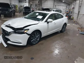 2019 Mazda 6 Grand Touring with VIN JM1GL1TYXK1505439, listed as a IAAI auction lot 41672678 with 52,990 mi miles and . Bid and sale history available at carsss.com. Image 20.