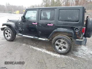 2016 Jeep Wrangler Unlimited 75th Anniversary with VIN 1C4HJWEG3GL181371, listed as a IAAI auction lot 41864965 with 64,259 mi miles and . Bid and sale history available at DreamBid. Image 3.