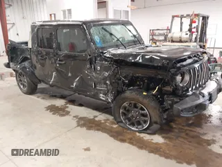 2023 Jeep Gladiator Overland z VIN 1C6HJTFG6PL552866, wystawiony jako IAAI lot #42086784 z przebiegiem 20 041 mil mil oraz . Historia ofert i sprzedaży dostępna na DreamBid. Obrazek 1.