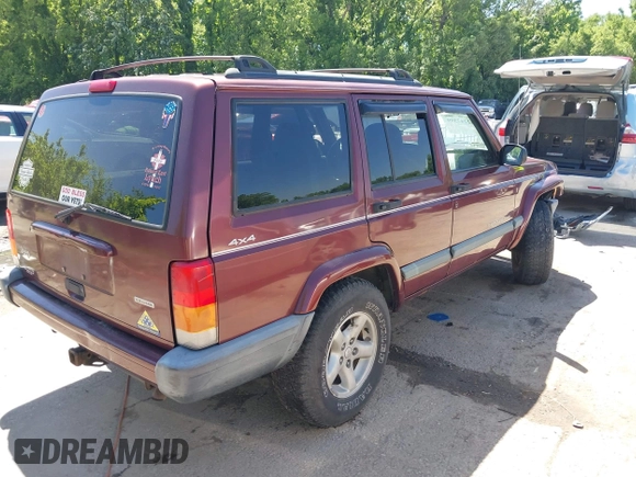 2001 Jeep Cherokee Sport with VIN 1J4FF48S51L516712, listed as a IAAI auction lot 42247399 with 323,576 mi miles and . Bid and sale history available at DreamBid. Image 4.
