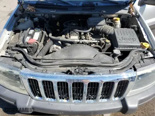 2003 Jeep Grand Cherokee Laredo with VIN 1J4GW48S13C556129, listed as a Copart auction lot 50389215 with 193,934 mi miles and Salvage Title. Bid and sale history available at carsss.com. Image 12.