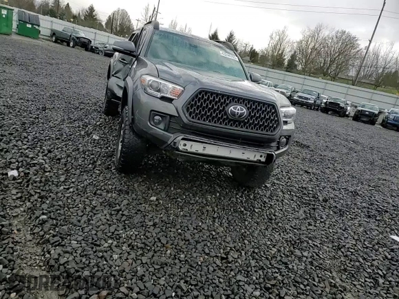 2018 Toyota Tacoma SR with VIN 3TMCZ5AN5JM132681, listed as a Copart auction lot 43244765 with 99,881 mi miles and Salvage Title. Bid and sale history available at carsss.com. Image 10.