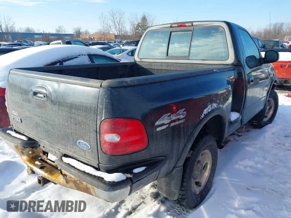 1997 Ford F-150 XL with VIN 1FTDF08W5VKD47103, listed as a IAAI auction lot 41345739 with 209,732 mi miles. Bid and sale history available at carsss.com. Image 4.