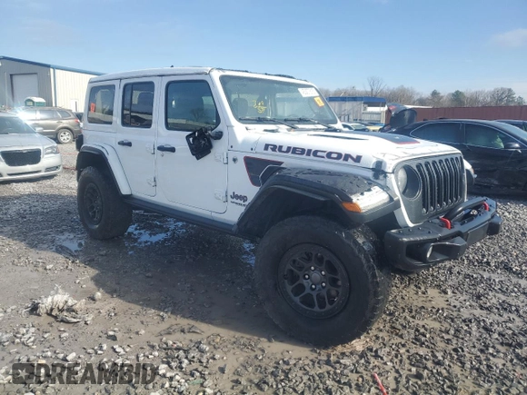 2021 Jeep Wrangler Unlimited Rubicon with VIN 1C4JJXFG1MW849460, listed as a Copart auction lot 45307515 with 54,517 mi miles and Salvage title. Bid and sale history available at DreamBid. Image 4.