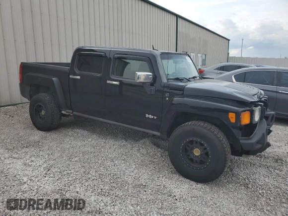 2009 Hummer H3 with VIN 5GNEN13L198138745, listed as a Copart auction lot 63202914 with 168,076 mi miles and Salvage Title. Bid and sale history available at DreamBid. Image 4.