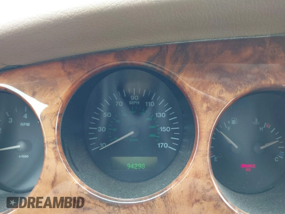 1997 Jaguar XK with VIN SAJGX274XVC017622, listed as a IAAI auction lot 41614339 with 94,298 mi miles and . Bid and sale history available at DreamBid. Image 14.
