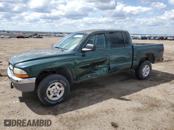 2001 Dodge Dakota z VIN 1B7HG2AX81S320355, wystawiony jako Copart lot #55410715 z przebiegiem 164 931 mil mil oraz Szkoda całkowita • Salvage title. Historia ofert i sprzedaży dostępna na DreamBid. Obrazek 1.