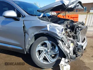 2021 Hyundai Santa Fe SEL z VIN 5NMS24AJ1MH356058, wystawiony jako IAAI lot #41800474 z przebiegiem 82 438 mil mil oraz . Historia ofert i sprzedaży dostępna na DreamBid. Obrazek 6.