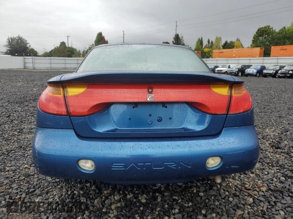 2001 Saturn SC z VIN 1G8ZR12791Z118164, wystawiony jako Copart lot #74393904 z przebiegiem 158 308 mil mil oraz Szkoda całkowita • Salvage title. Historia ofert i sprzedaży dostępna na DreamBid. Obrazek 6.