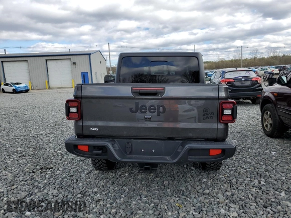 2023 Jeep Gladiator Sport S with VIN 1C6HJTAG9PL572388, listed as a Copart auction lot 53346475 with 11,081 mi miles and Salvage title. Bid and sale history available at DreamBid. Image 6.