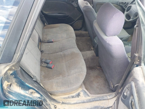 1999 Subaru Legacy L z VIN 4S3BK4355X6305664, wystawiony jako IAAI lot #42077758 z przebiegiem 70 585 mil mil oraz . Historia ofert i sprzedaży dostępna na DreamBid. Obrazek 8.