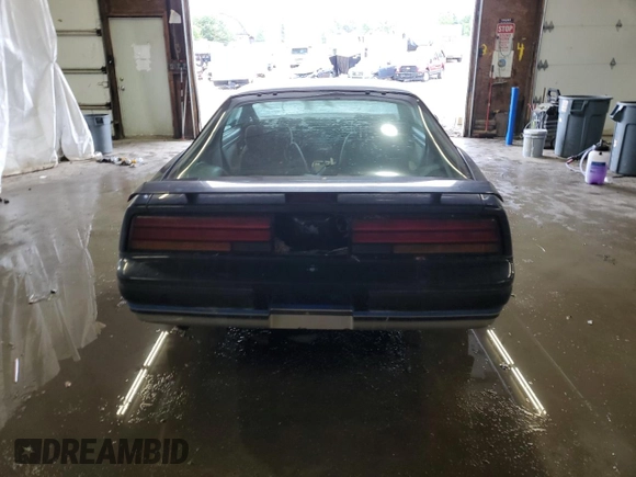 1987 Pontiac Firebird with VIN 1G2FS21S4HN213083, listed as a Copart auction lot 69101254 with 172,214 mi miles and Salvage title. Bid and sale history available at DreamBid. Image 6.