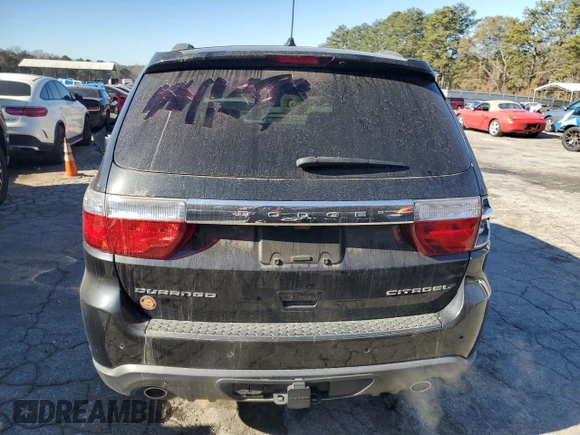 2013 Dodge Durango Citadel with VIN 1C4SDHETXDC661103, listed as a Copart auction lot 83579674 with 173,543 mi miles and Salvage Title. Bid and sale history available at carsss.com. Image 6.
