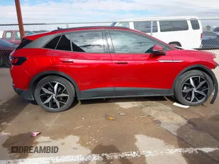 2023 Volkswagen ID.4 S z VIN 1V25MPE87PC018469, wystawiony jako IAAI lot #41243255 z przebiegiem 11 728 mil mil oraz . Historia ofert i sprzedaży dostępna na DreamBid. Obrazek 14.