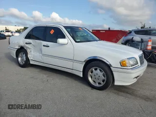 1999 Mercedes-Benz C 230/260/280/320 with VIN WDBHA24G5XA780454, listed as a Copart auction lot 73794674 with 90,578 mi miles and Salvage Title. Bid and sale history available at carsss.com. Image 4.