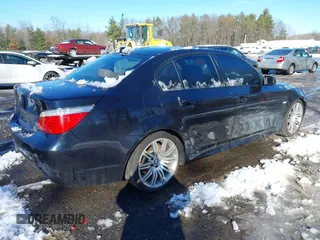 2008 BMW 5 Series 550i with VIN WBANW53518CT54786, listed as a IAAI auction lot 41546342 with 121,094 mi miles. Bid and sale history available at carsss.com. Image 4.
