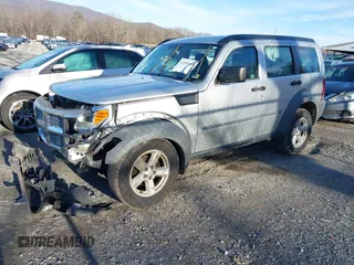 2007 Dodge Nitro SXT with VIN 1D8GU28K67W740794, listed as a IAAI auction lot 41591855 with 162,709 mi miles. Bid and sale history available at carsss.com. Image 2.
