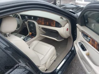 2004 Jaguar XJ with VIN SAJEA71C34SG10171, listed as a IAAI auction lot 41412081 with 150,488 mi miles. Bid and sale history available at carsss.com. Image 5.