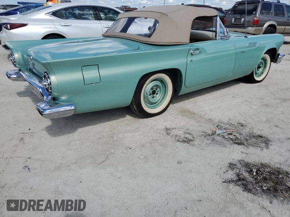 1957 Ford Thunderbird with VIN D7FH182410, listed as a Copart auction lot 77671374 with 319 mi miles and Salvage Title. Bid and sale history available at DreamBid. Image 3.